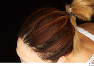 Groom references of Amal brown hair high messy bun 0002.jpg